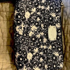 Michael Kors Navy and White Flowered Wristlet.